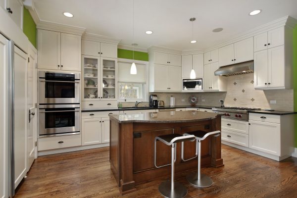 10537548 - luxury kitchen with island and white cabinetry