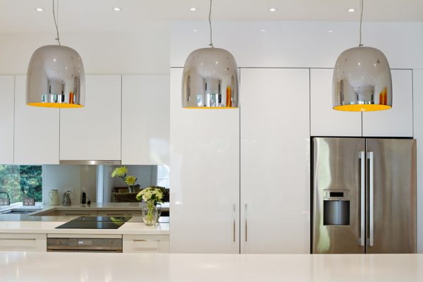 37386986 - contemporary pendant lights hanging over kitchen island bench