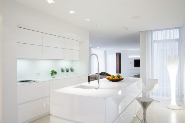 39951109 - white clean kitchen with island in the middle